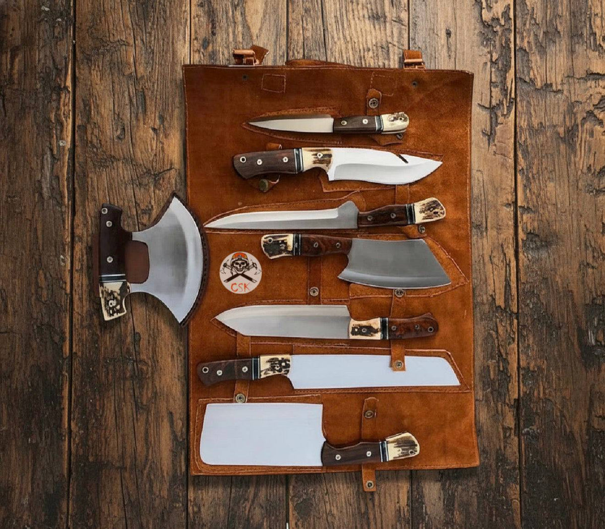 Hand-forged chef knife from cskforged outdoor kitchen knife set, with a leather roll, ideal for camping and barbecue cooking.