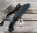 Black-coated hand-forged steel hunting knife with horn handle and custom leather sheath by cskforged.