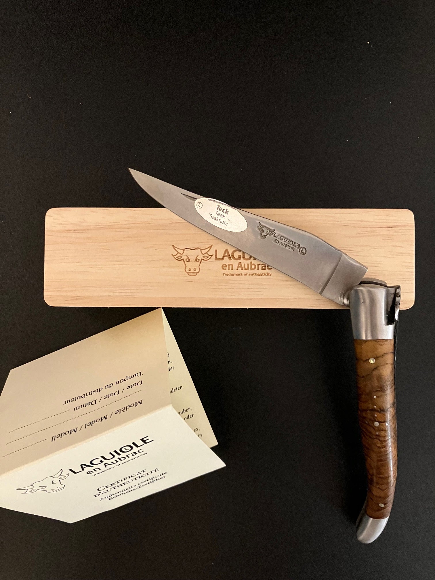 Laguiole en Aubrac Handcarved Plates Multipurpose Knife with Teak Wood Handle, 4.75-Inches, Brushed Bolsters