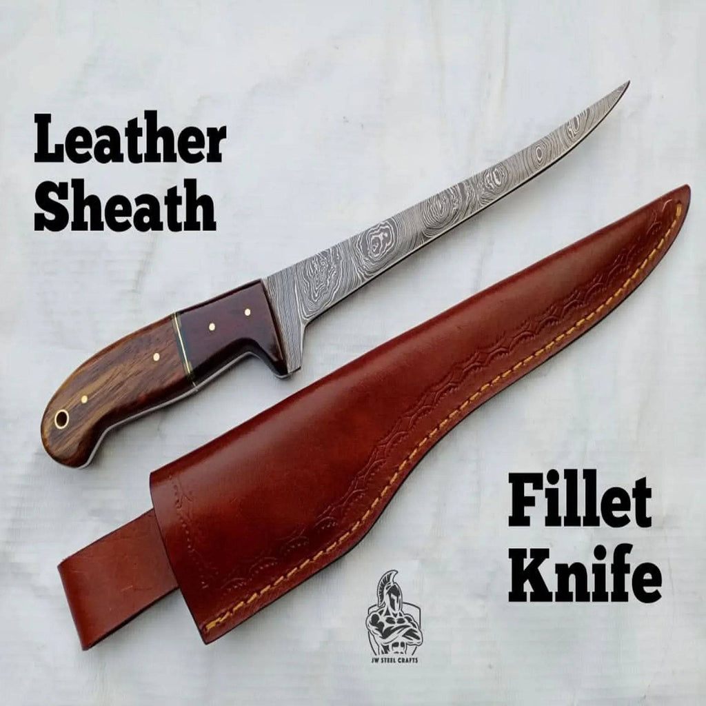 Handmade JW SteelCrafts fillet knife with a sleek blade and wooden handle, designed for precise fish filleting.