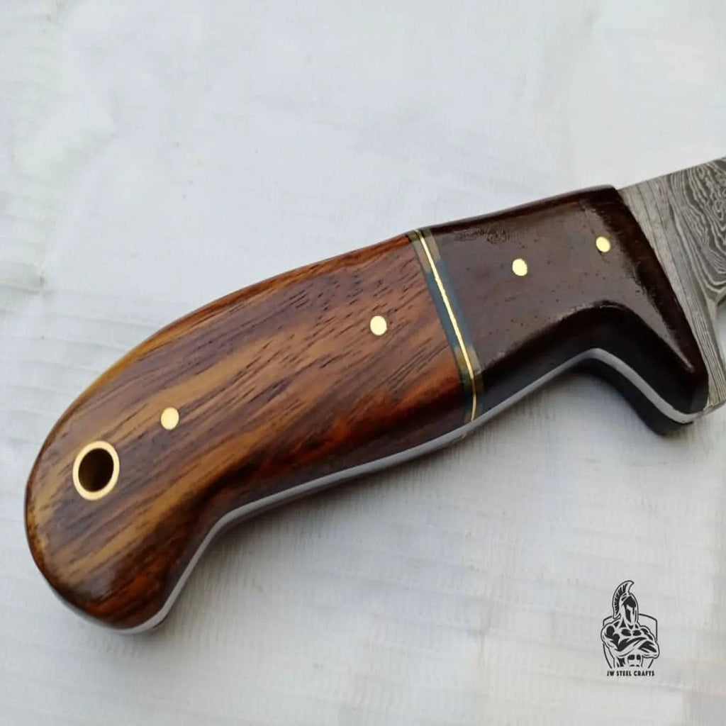 Handmade JW SteelCrafts fillet knife with a sleek blade and sturdy handle, ideal for precise fish filleting.