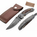 Damascus Antler Ridge pocket knife with stag horn handle and liner lock folder design by JW SteelCrafts.