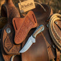 Handmade JW SteelCrafts Antler Ridge Skinner Knife with an 8-inch Damascus blade and stag horn handle.