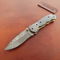 Damascus Black Horn Ridge Pocket Knife with Brass Bolster Accent