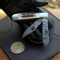 Jigged Stag Trapper Damascus steel EDC folding knife by Divine Knives | Relic & Reel