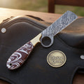 Twist Pattern Bull Cutter Damascus steel knife with red marbled resin handle - Relic & Reel