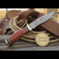 Field-Ready Damascus Gut Hook Knife with Rich Burgundy Wood Grip