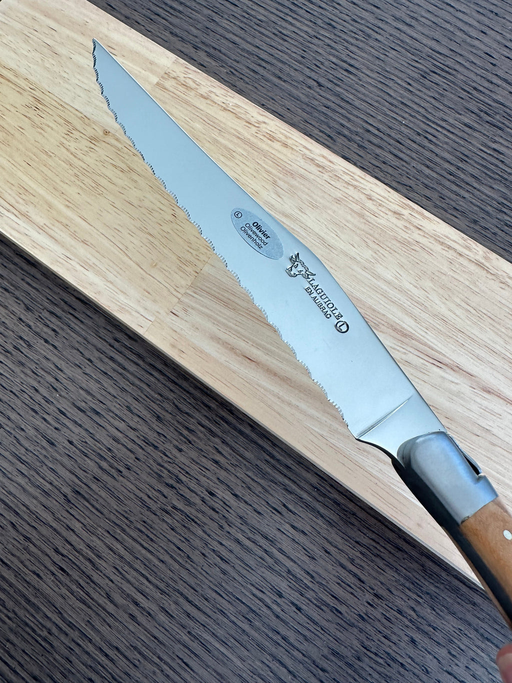Laguiole en Aubrac Stainless Steel Bread Serrated Knife With Olivewood Handle, 7-in