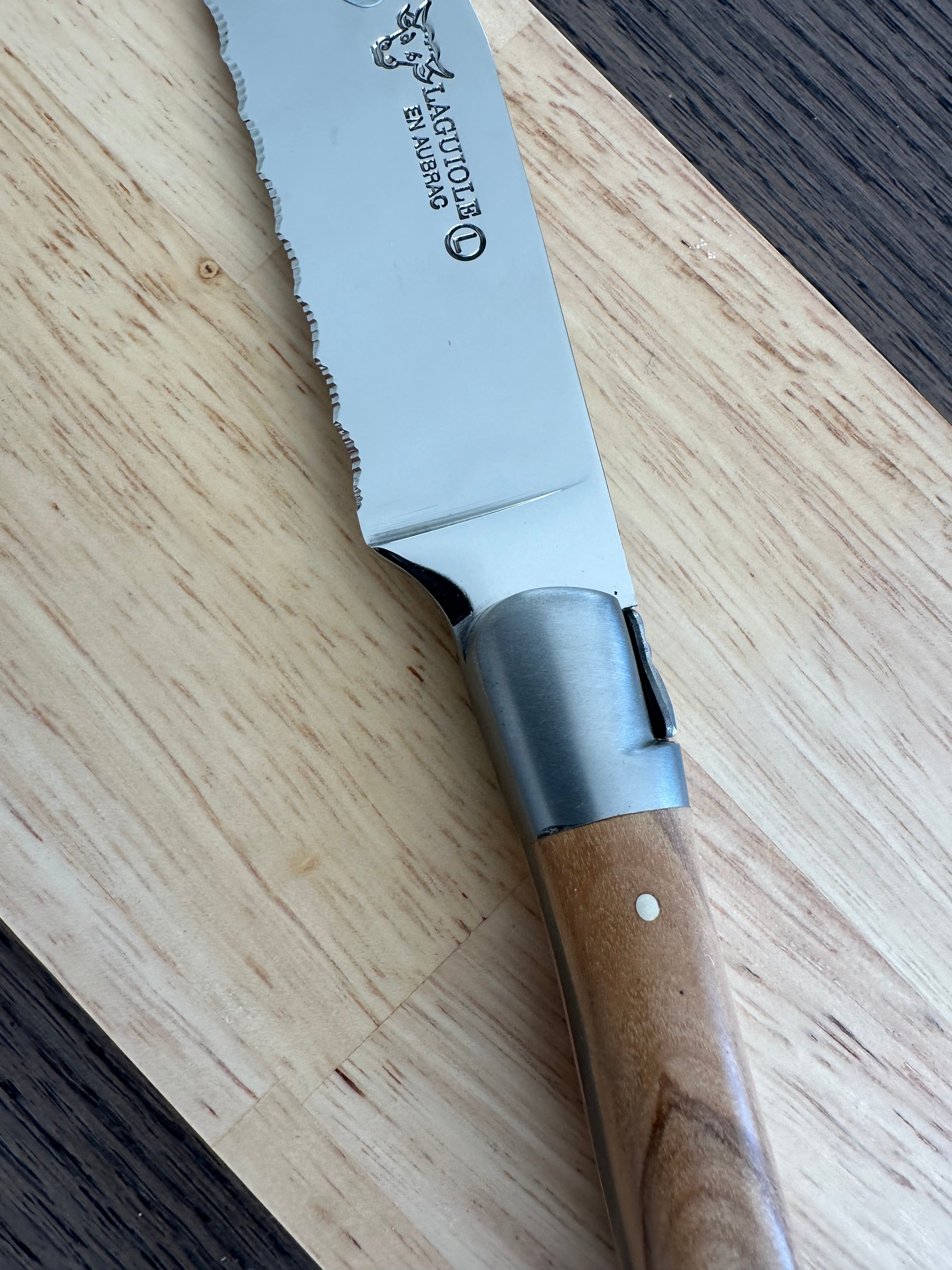 Laguiole en Aubrac Stainless Steel Bread Serrated Knife With Olivewood Handle, 7-in