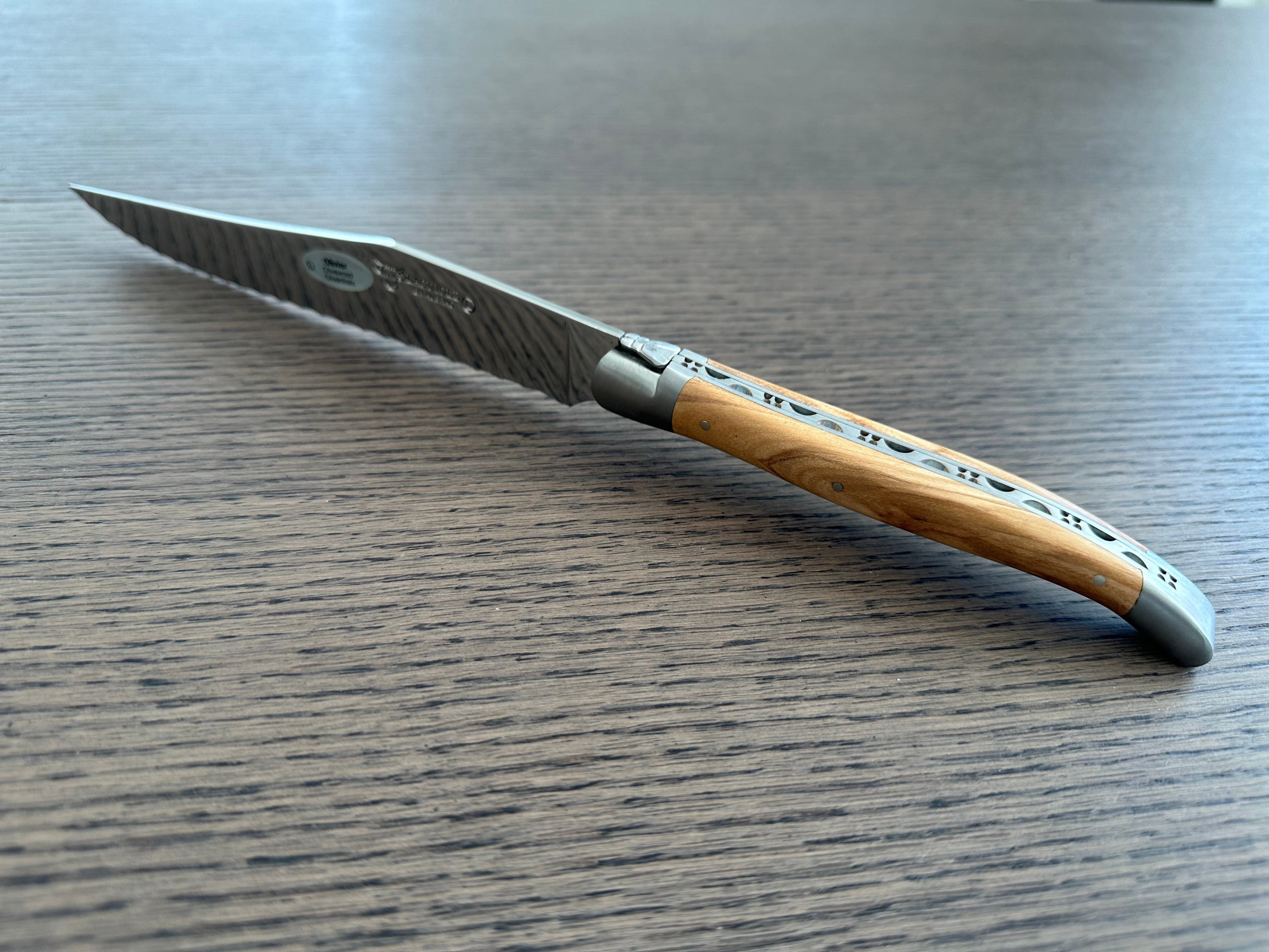 Laguiole en Aubrac Stainless Steel Bread Serrated Knife With Olivewood Handle, 7-in
