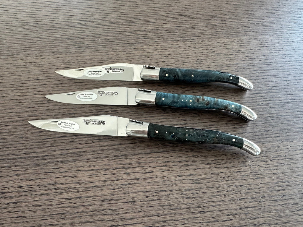 Laguiole en Aubrac Handcarved Plates Multipurpose Knife with Stabilized Blue Poplar Burl Handle, Polished Bolsters, 4.75-Inches