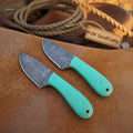 JW SteelCrafts 2-piece Mark Cowboy Skinner set with turquoise resin handles, featuring durable skinning knives for outdoor use.