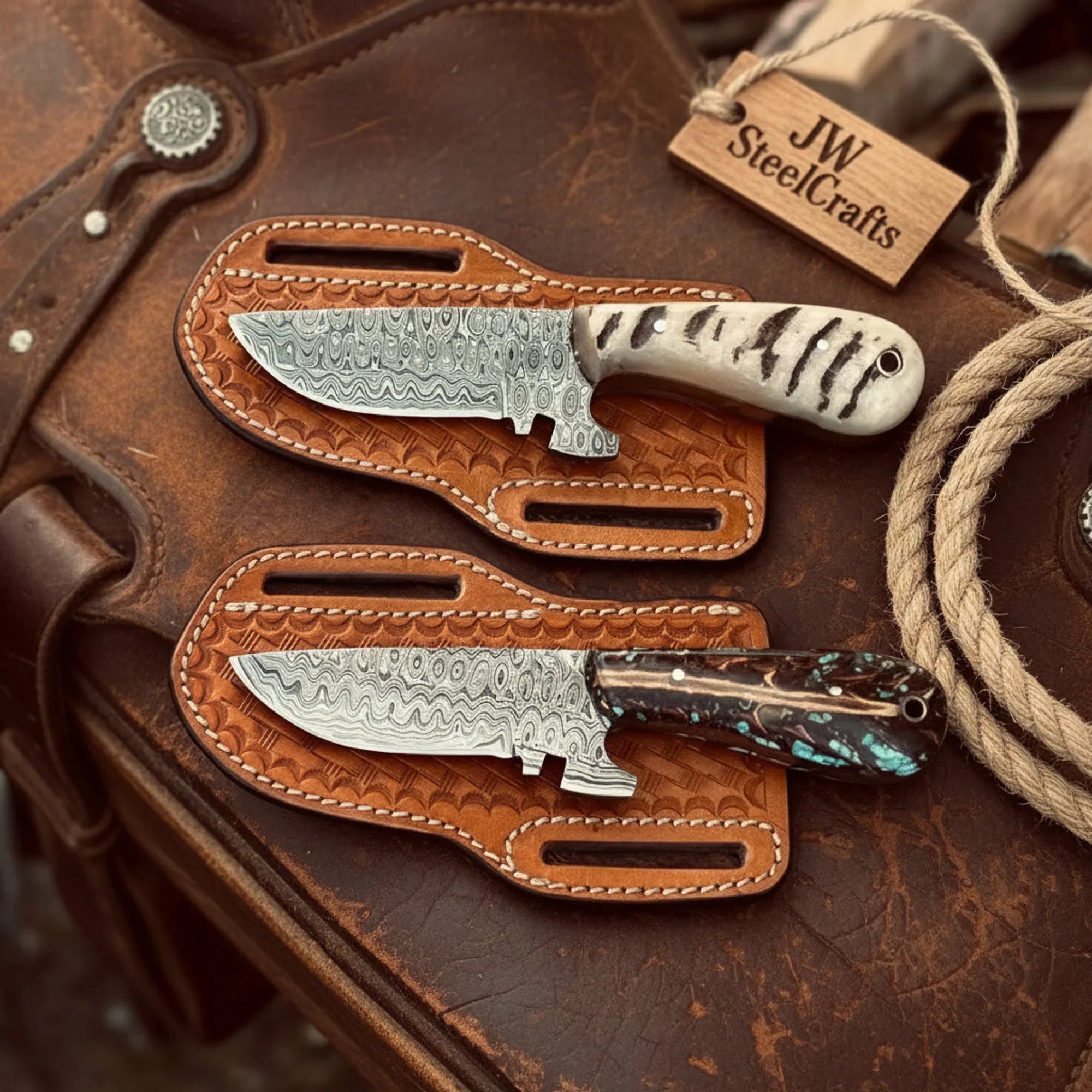 2 Piece Damascus Tracker Knife Set with Ram Horn and Pinecone Resin Handles