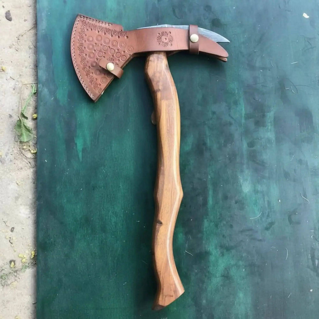 Handmade Damascus bearded spike tomahawk with forged spike poll by JW SteelCrafts, featuring a detailed wooden handle.