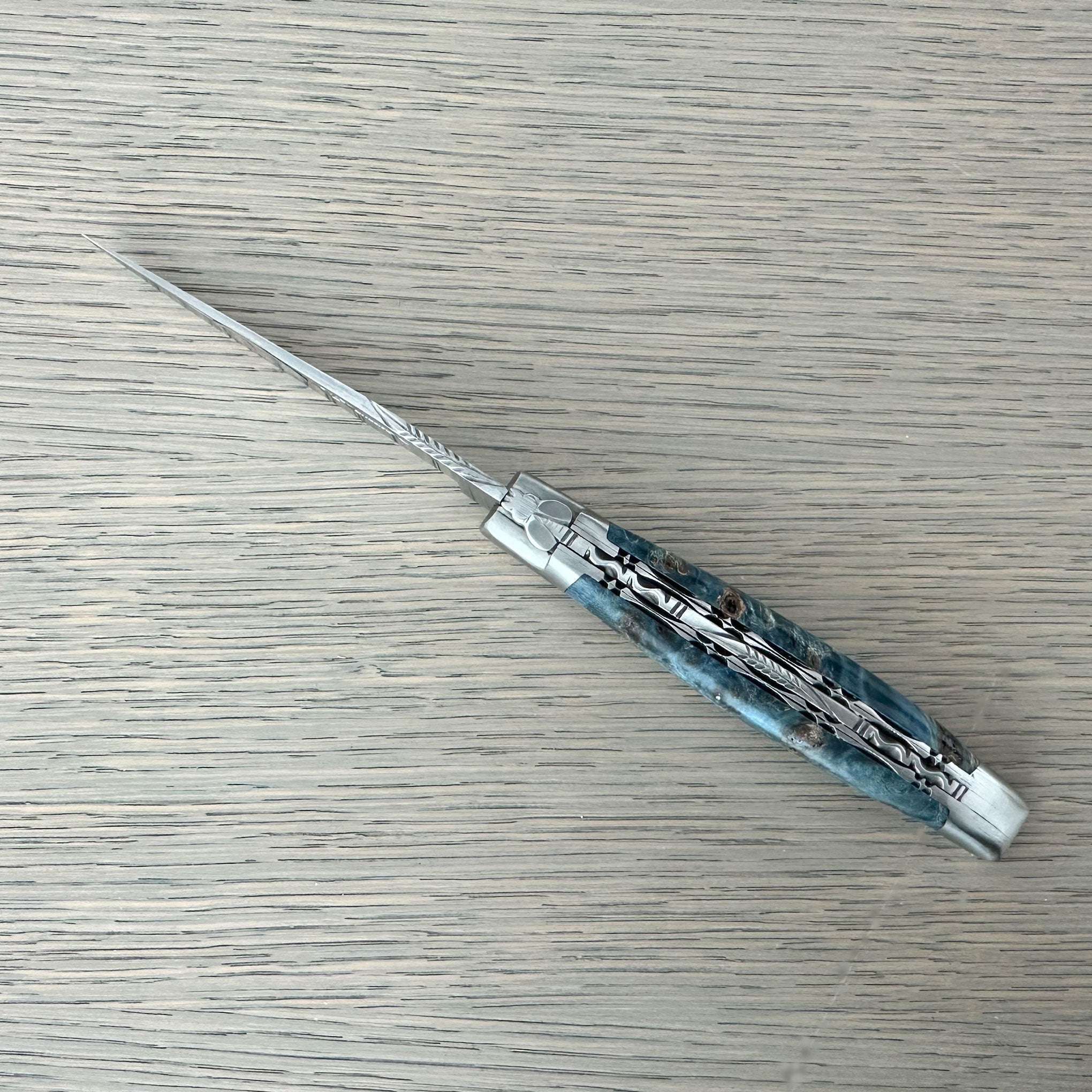 Laguiole en Aubrac Folding Knife Double Plated Stabilized Blue Poplar Burl, 4.75-in