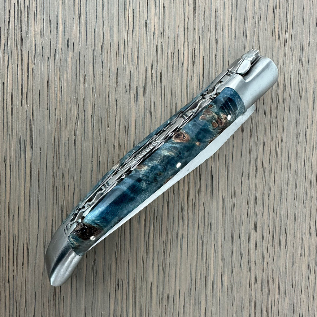 Laguiole en Aubrac Folding Knife Double Plated Stabilized Blue Poplar Burl, 4.75-in