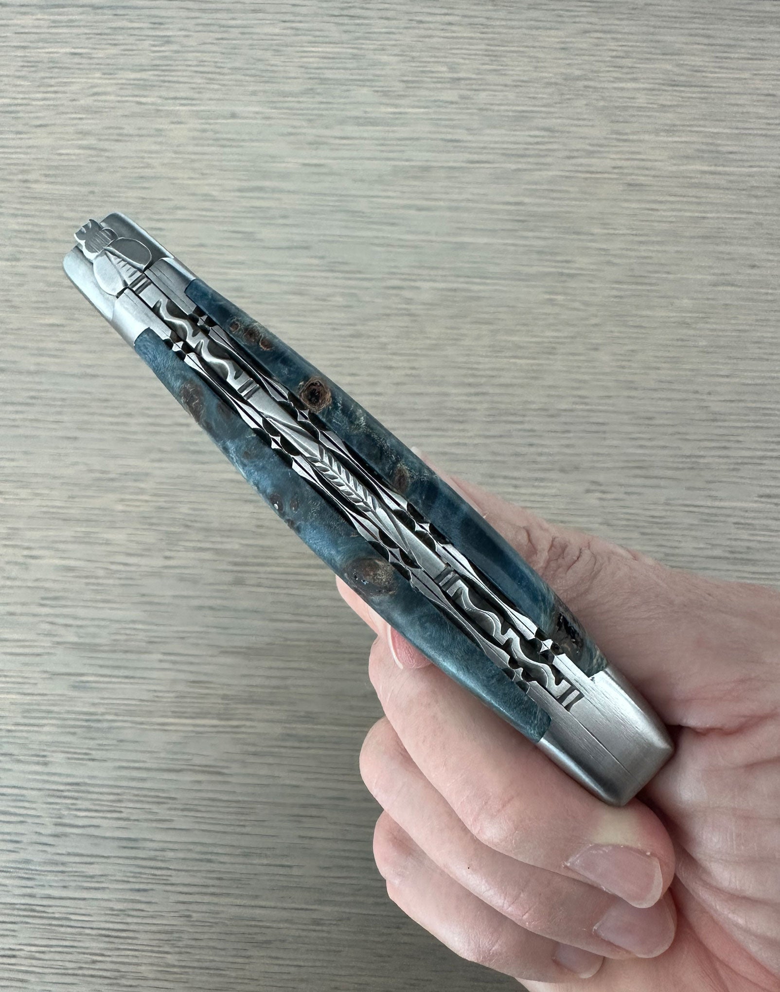 Laguiole en Aubrac Folding Knife Double Plated Stabilized Blue Poplar Burl, 4.75-in