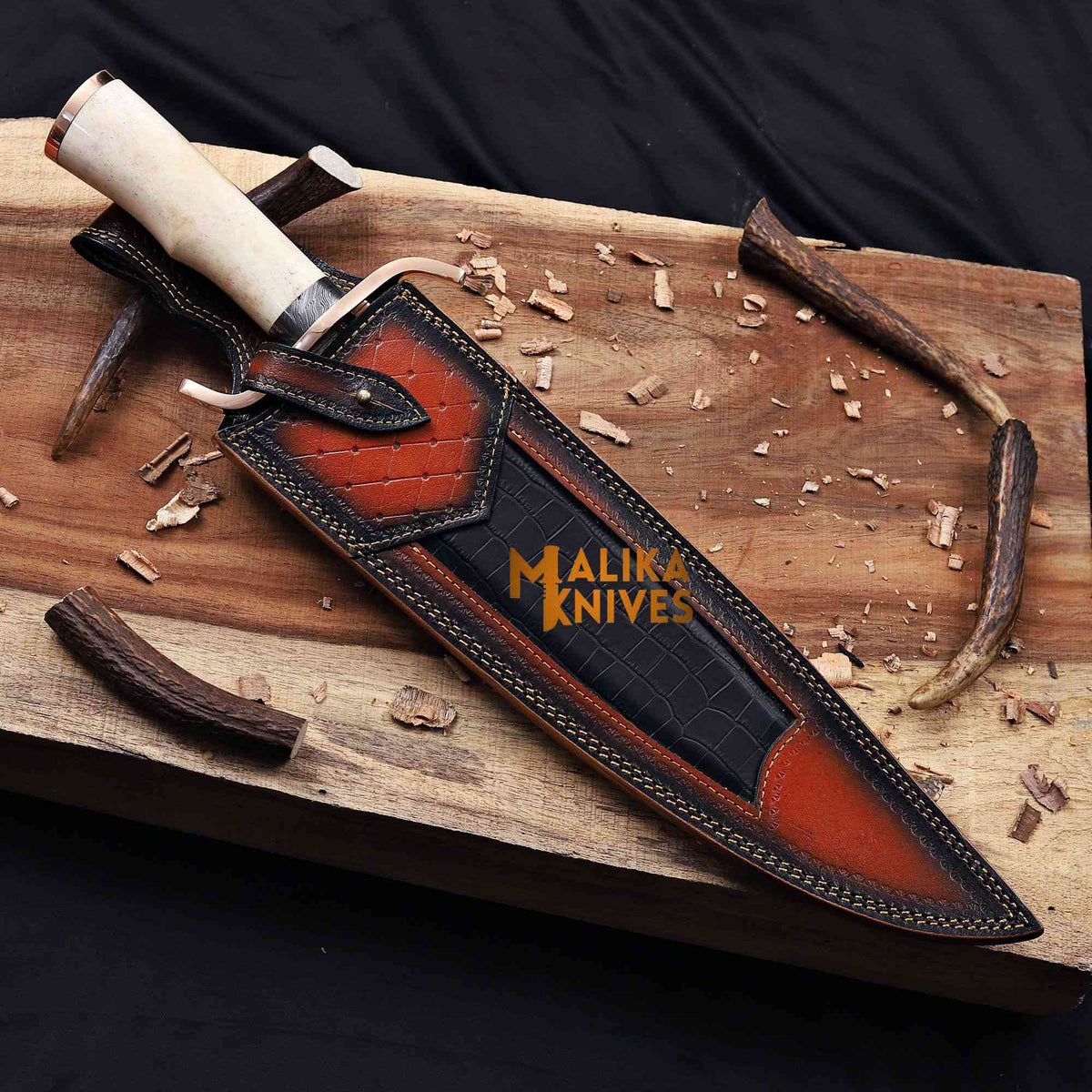Copper Damascus Alamo Musso Bowie Knife by MALIKA KNIVES with sheath, full view showcasing the detailed blade and handle design.