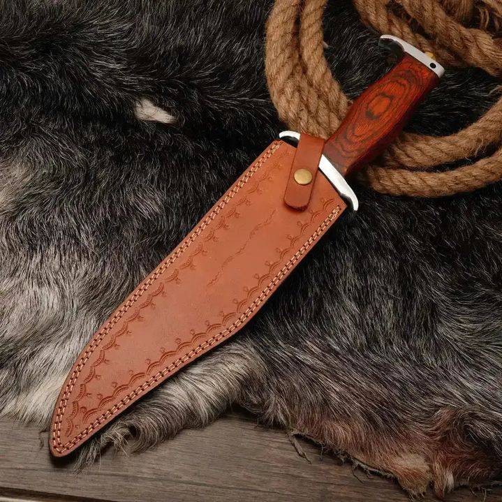 MALIKA KNIVES Rambo Bowie Knife with D2 steel blade and leather sheath, featuring a sleek simple design and sturdy construction.