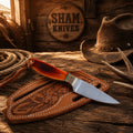SHAM KNIVES Buckaroo Skinning Belt Knife with D2 steel blade and sheep horn handle, designed for effective outdoor skinning tasks.