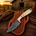 Cowboy Belt Knife with 3.5-inch Damascus steel blade and bone handle, by SHAM KNIVES, displayed on a rustic leather belt.