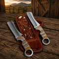 Cowboy Bull Cutter Knife with D2 steel blade and copper engraved handle, shown with pancake sheath, by cskforged.