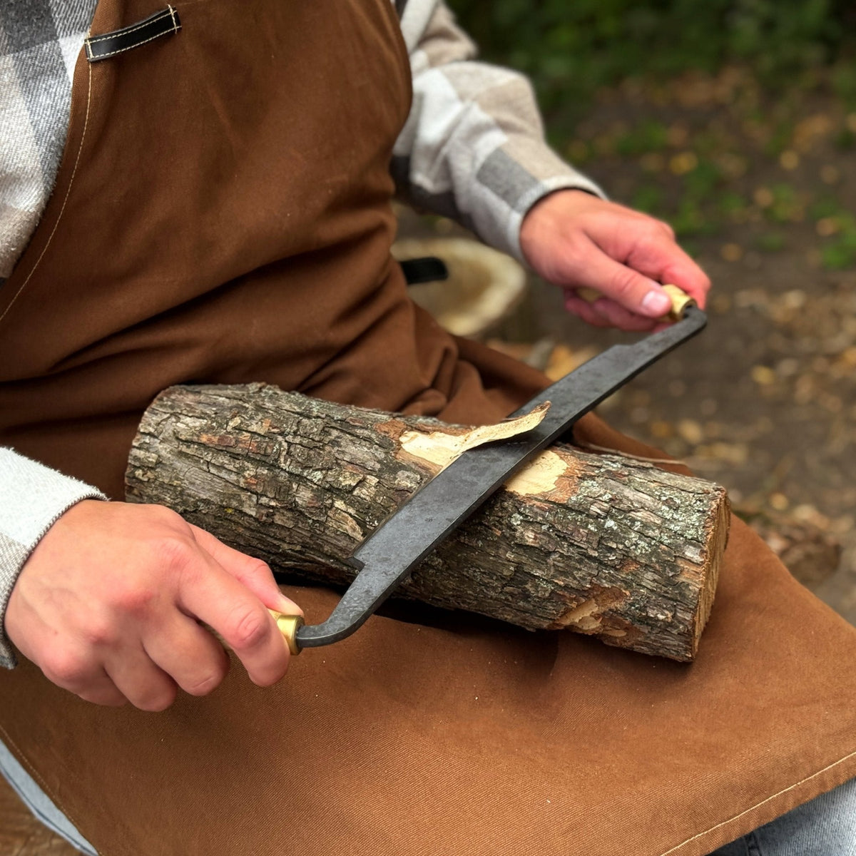 Sharky Forged Steel Tools curved draw knife with a 25.5 cm (10 inch) cutting edge, ideal for shaping and shaving wood.