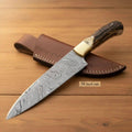 Custom Damascus clip point hunting knife with stag handle, fixed blade outdoor utility, includes sheath by JW SteelCrafts.