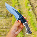 MALIKA KNIVES D2 Stag Hunting Knife with 7-inch full tang blade, ideal for outdoor hunting and rugged outdoor tasks.