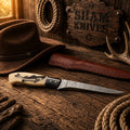 Damascus Steel Fillet Knife with engraved bone handle by SHAM KNIVES, ideal for fishing and filleting seafood.