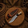 Deer hunting Bowie knife by SHAM KNIVES with Frostfang Damascus steel blade and stag handle, ideal for hunting and outdoor use.