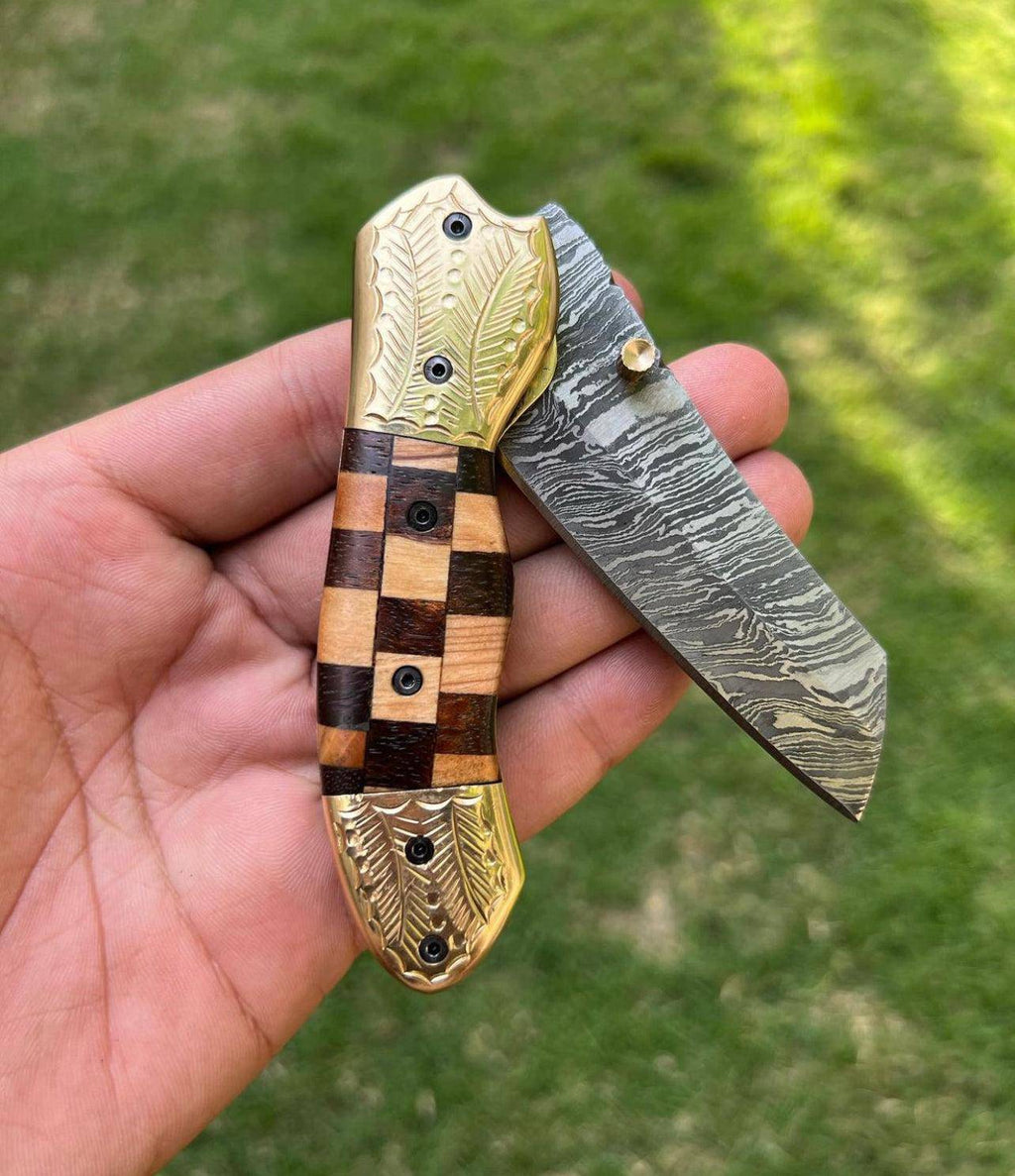 Custom handmade Damascus steel Tanto blade EDC folding pocket knife by cskforged, featuring intricate layered steel and a sturdy handle.
