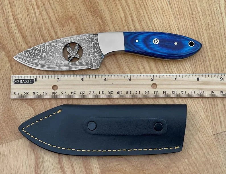 Damascus steel fixed blade hunting knife by SHAM KNIVES, featuring a sharp blade and ergonomic handle for outdoor hunting.