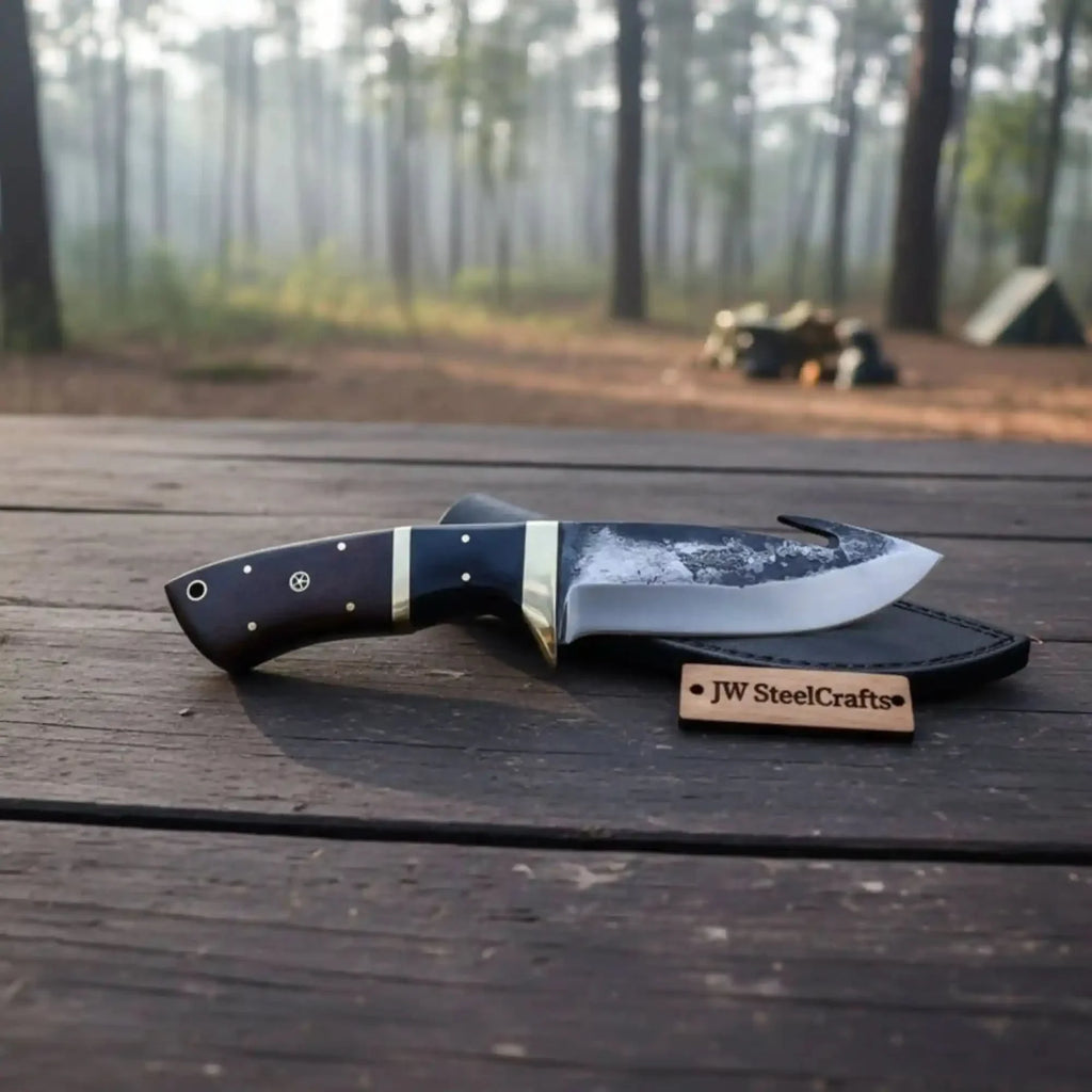 Gut hook knife with wood and brass handle