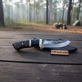 Gut hook knife with wood and brass handle