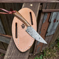 Handcrafted Buckaroo Belt Knife by SHAM KNIVES with 3.5” Damascus steel fixed blade, rosewood handle, and leather sheath.