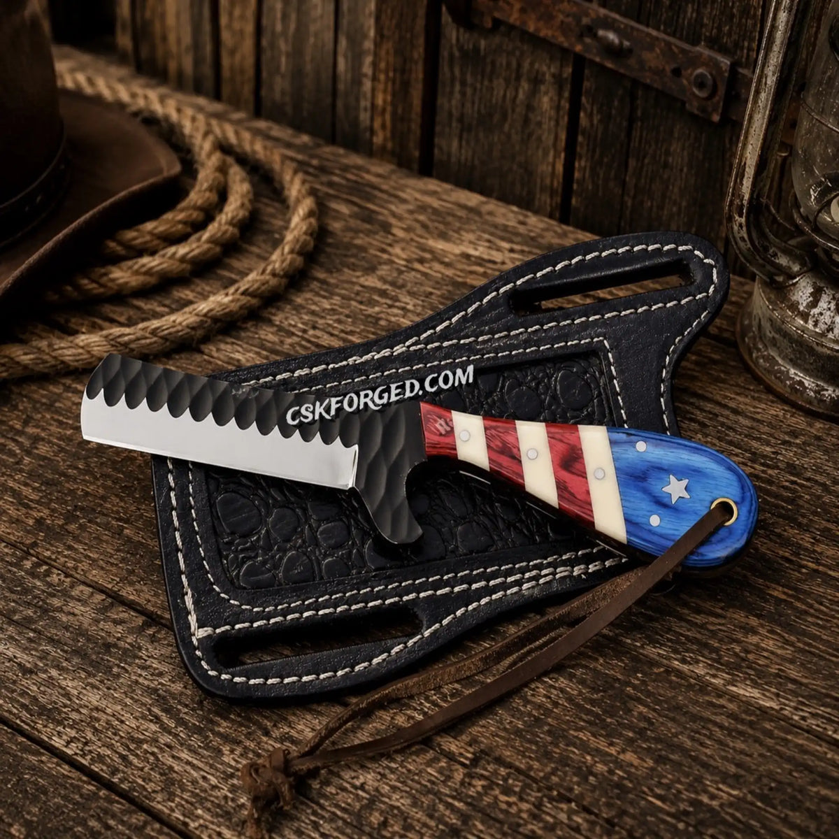Handcrafted bull cutter knife with 1095 powder-coated blade and Texas flag handle by cskforged.