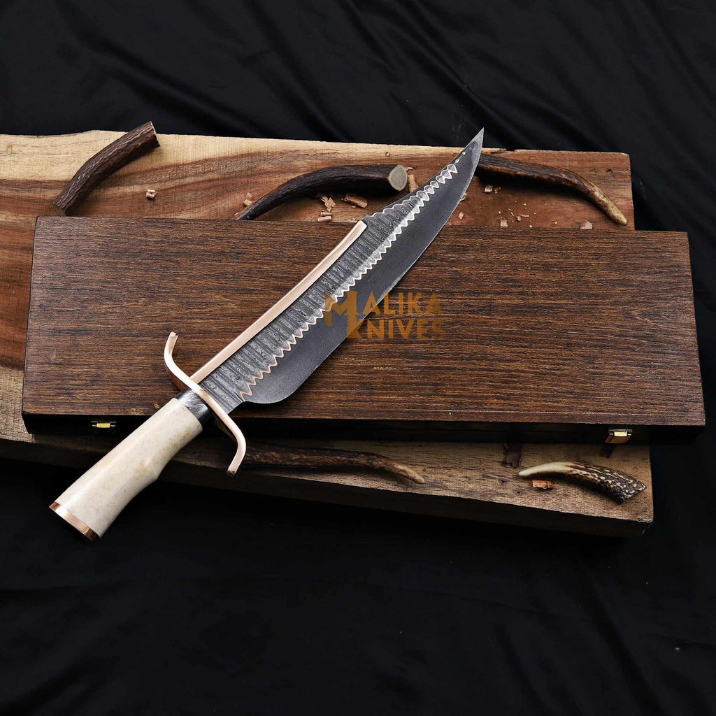 Handmade Copper Damascus Alamo Musso Bowie Knife by MALIKA KNIVES with a detailed Damascus blade and traditional handle.