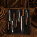 Handmade SHAM KNIVES chef knife set with five carbon steel knives featuring wood handles and Damascus blades.