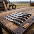 6-Piece Ladder Pattern Damascus Knife Set with Black Wood Handles and Steel Bolsters