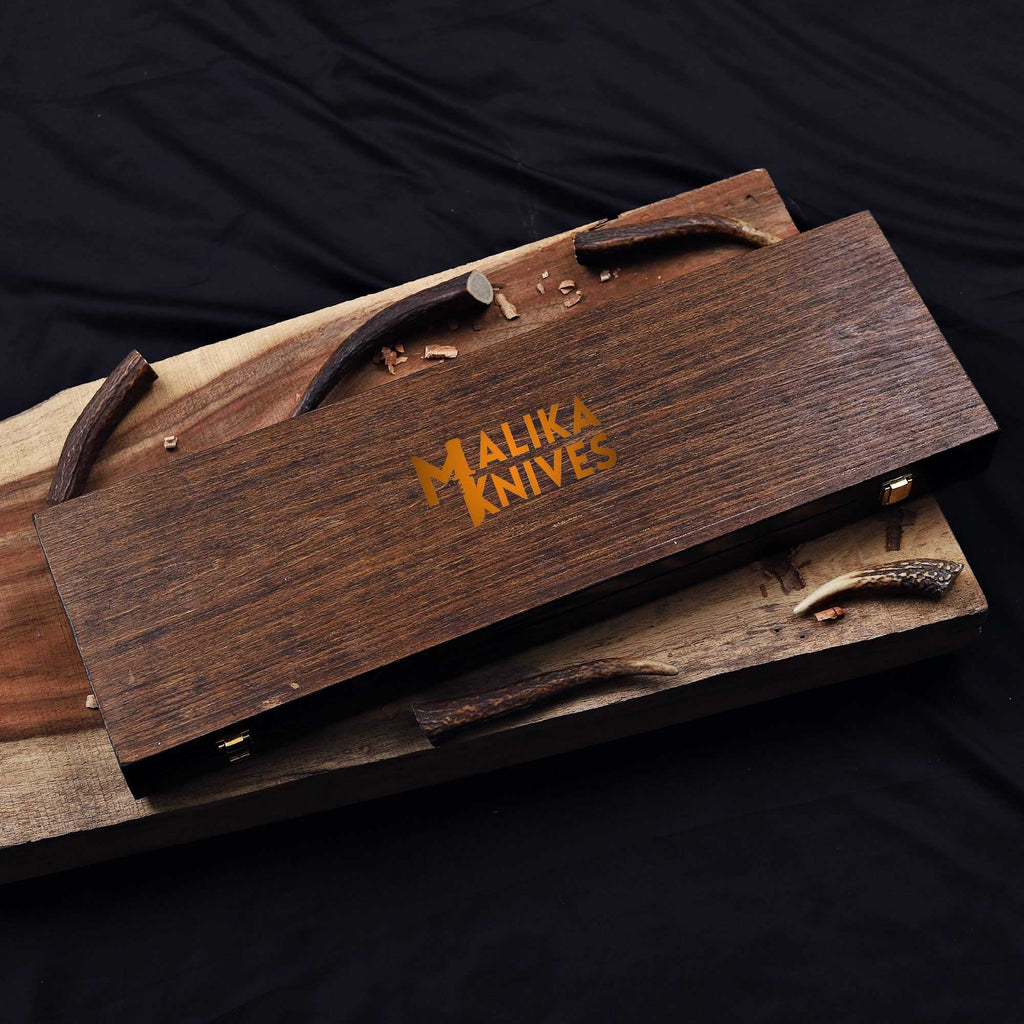 Handmade Copper Damascus Alamo Musso Bowie Knife with wooden display box, crafted by MALIKA KNIVES, showcasing a detailed Damascus blade.