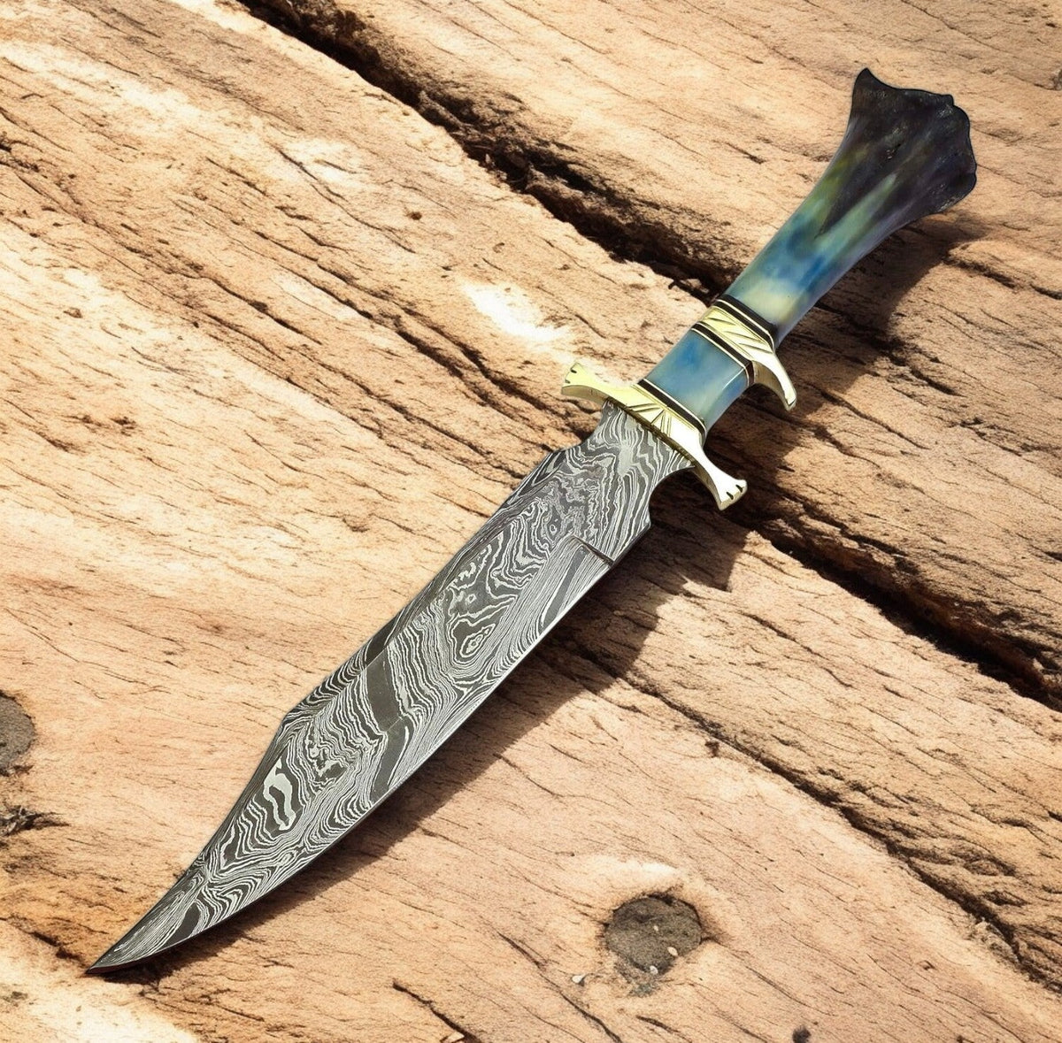 Handmade Damascus Bowie Knife with colored bone handle and detailed blade, crafted by Damascus Knife Store.