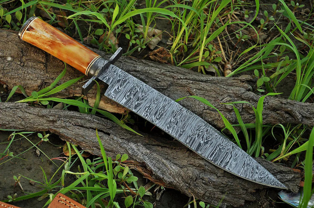 Custom handmade Damascus steel hunting Bowie knife with bone handle, 15-inch blade, Damascus guard, and leather sheath.