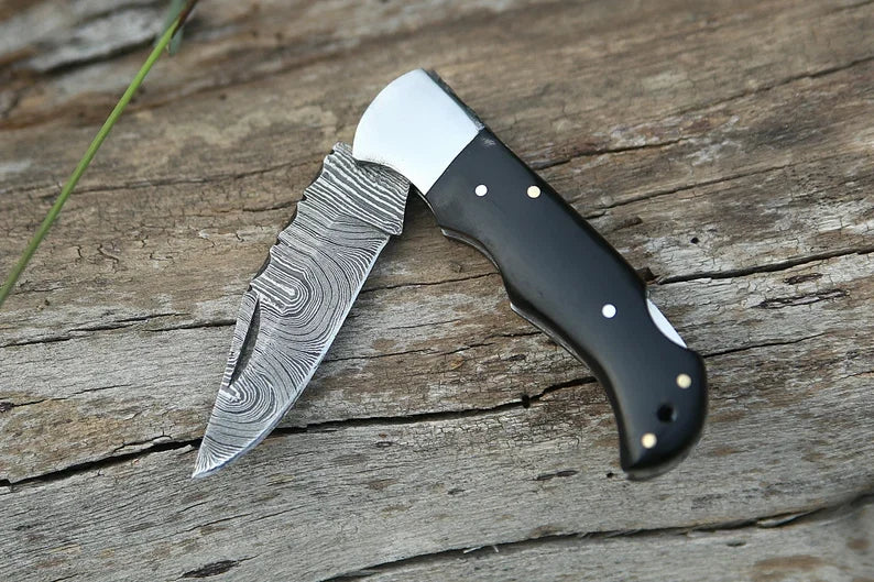 Custom Damascus Folding Knife – 7” Buffalo Horn Handle with Steel Bolster & Leather Sheath