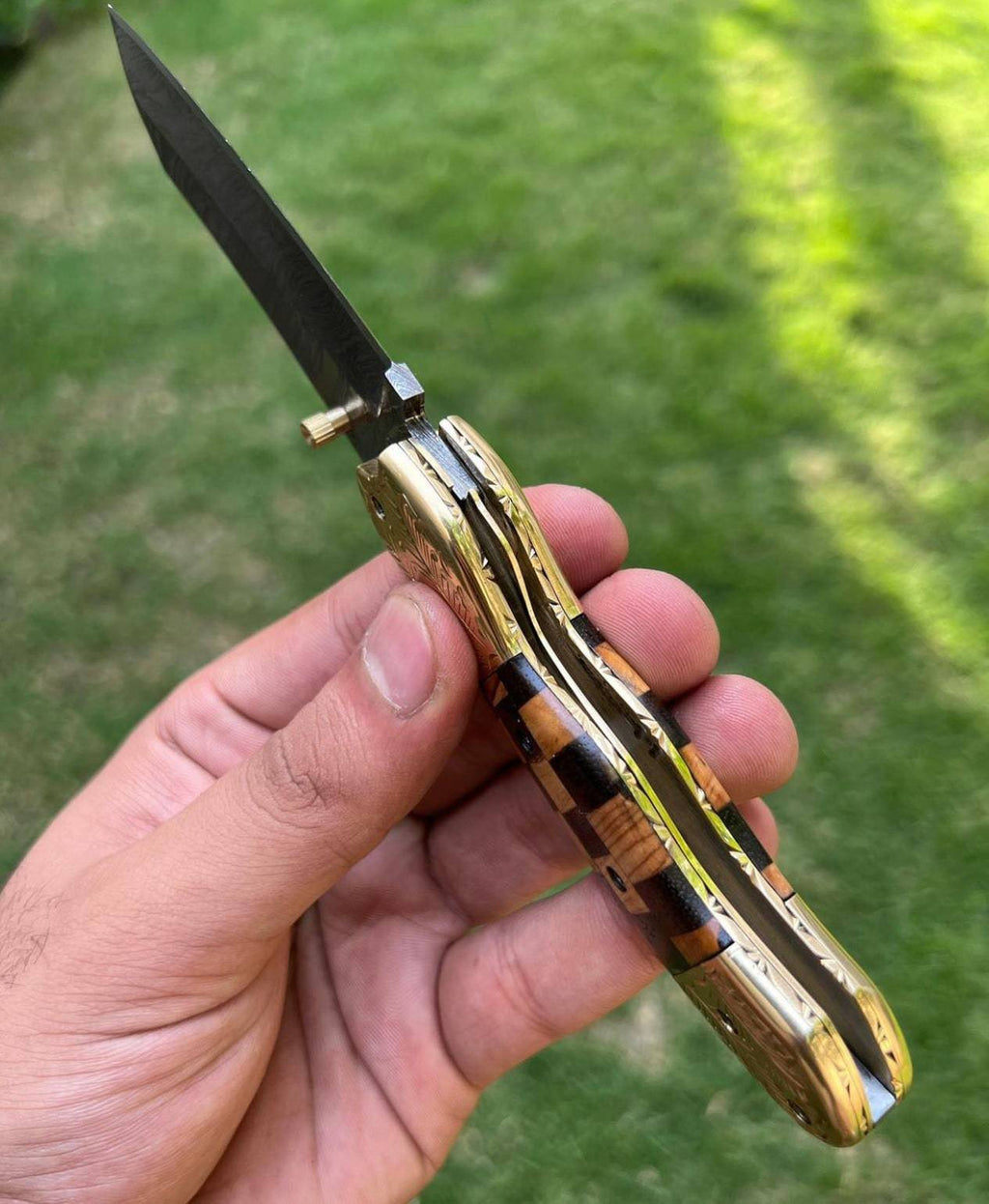 Custom handmade Damascus steel Tanto blade EDC folding pocket knife by cskforged with textured handle and sleek design.