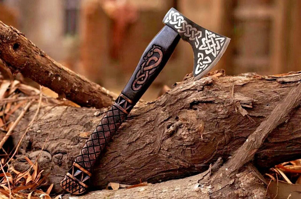 Handmade Viking axe with wooden handle and metal blade, custom forged by Knives Gear Garage.