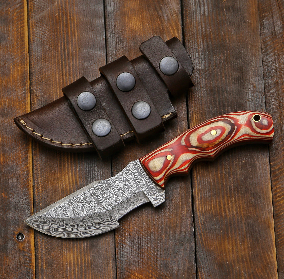 Tom Brown Tracker survival knife with fixed blade and durable handle, ideal for outdoor and bushcraft activities.