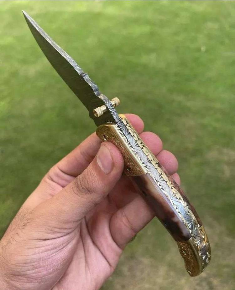 Damascus Blade EDC pocket knife by cskforged with a patterned Damascus steel blade and ergonomic handle, ready for everyday carry.