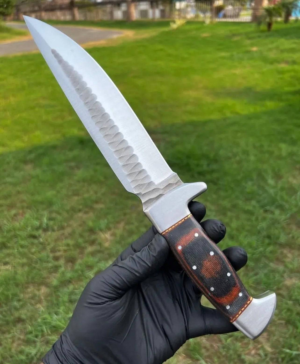 Fixed blade camping knife by cskforged with D2 steel, hand forged blade and black handle, suitable for outdoor survival and camping.