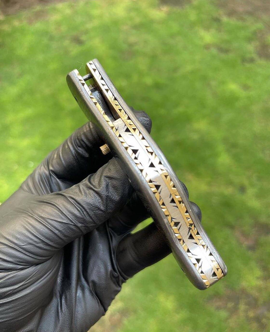 Damascus folding pocket knife with full blade and textured handle, designed for everyday carry by cskforged.